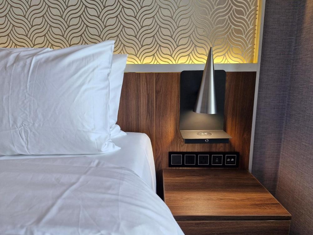 Ocean View Hotel Kuwait room with power outlets and bedside lighting
