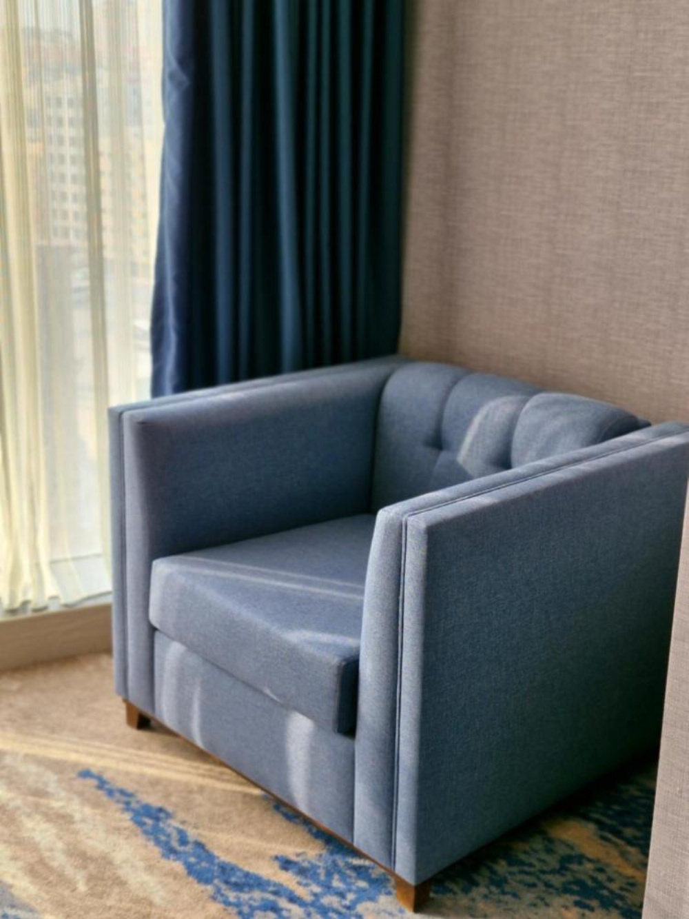 Seating area with two-seater sofa at Hotel in Kuwait