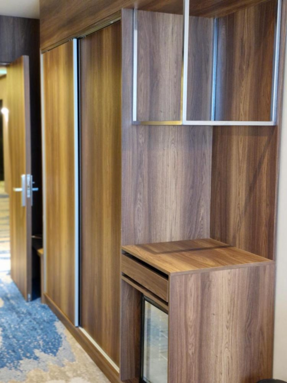 Closet and desk area in Ocean View Hotel Kuwait suite