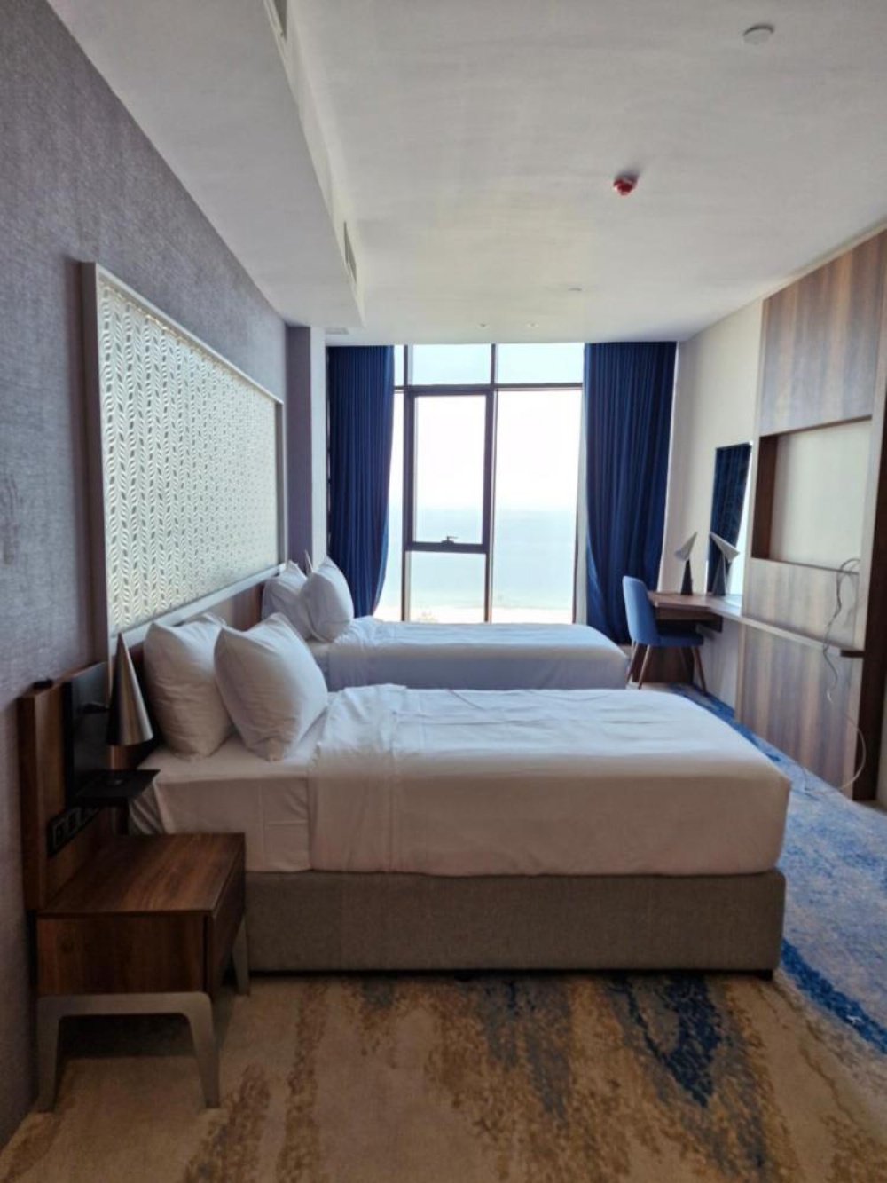 Ocean View Hotel Kuwait room with sea view and king bed