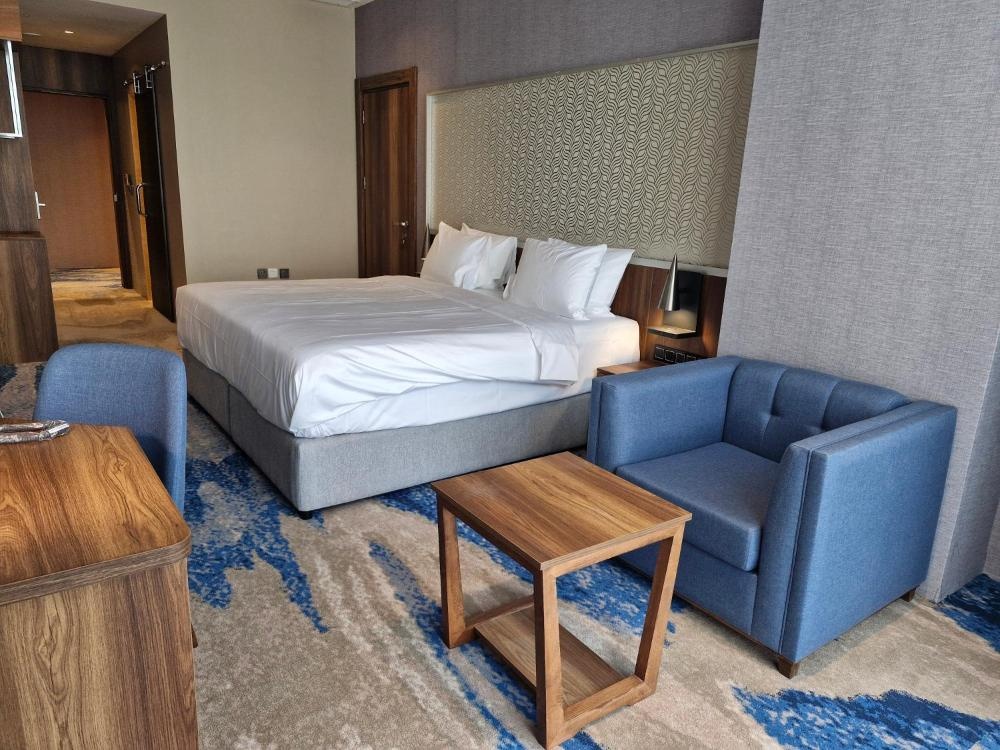 Seating and sleeping area in Ocean View Hotel Kuwait suite